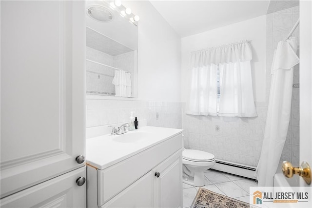 full bathroom with shower / tub combo, tile patterned flooring, a baseboard heating unit, toilet, and tile walls