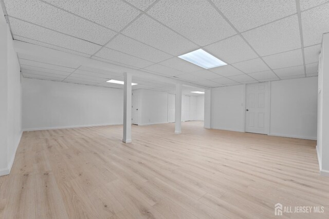 40 Montclair Ave, Edison, NJ 08820 - finished basement with a drop ceiling, wood finished floors, and baseboards