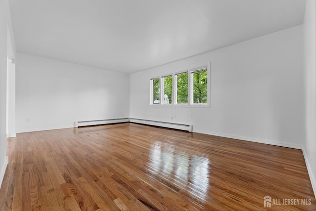 40 Montclair Ave, Edison, NJ 08820 - empty room with wood finished floors and baseboards