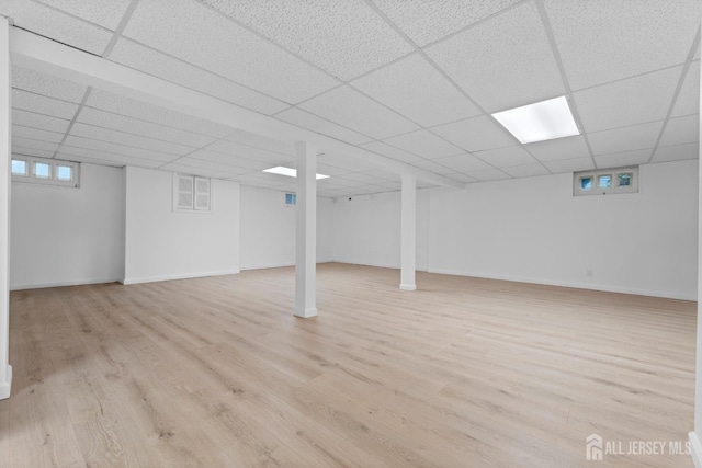 40 Montclair Ave, Edison, NJ 08820 - below grade area featuring a paneled ceiling, light wood-style flooring, and baseboards