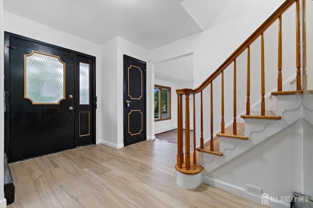 40 Montclair Ave, Edison, NJ 08820 - foyer featuring wood finished floors, baseboards, and stairway