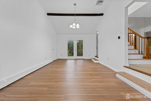 40 Montclair Ave, Edison, NJ 08820 - unfurnished dining area featuring a baseboard heating unit, stairway, a chandelier, and light wood-type flooring