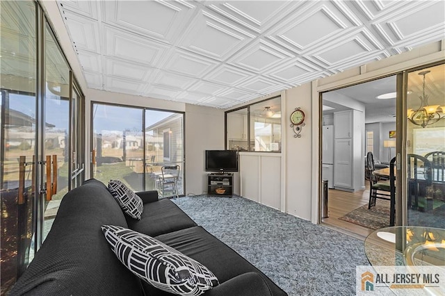 21 Celtis Plz Unit 21B, Monroe, NJ 08831 - living room featuring an ornate ceiling and wood finished floors