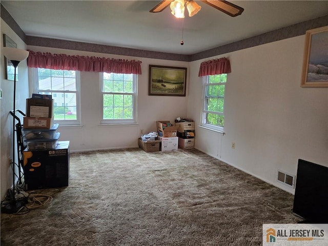 115 Griggs Pl Unit 115, East Brunswick, NJ 08816 - carpeted spare room with plenty of natural light, ceiling fan, and baseboards