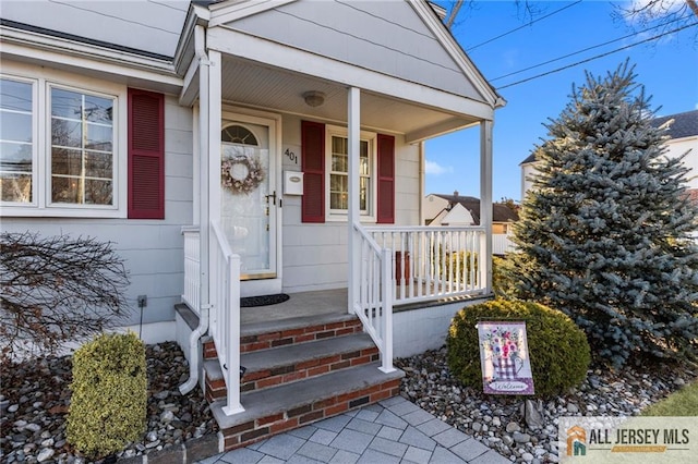 entrance to property with covered porch