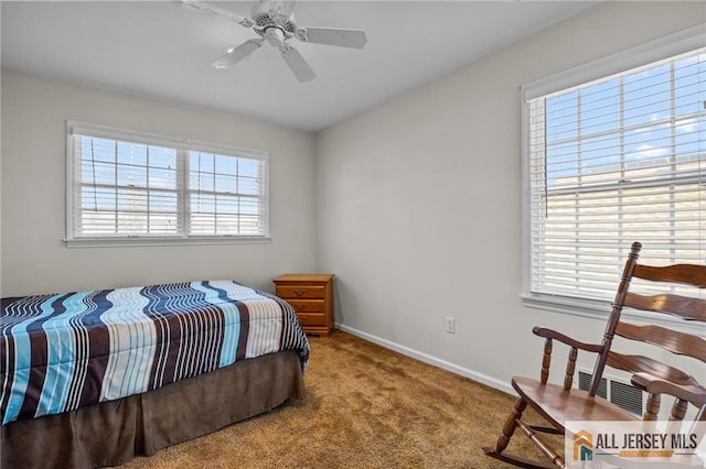 bedroom featuring baseboards, carpet floors, visible vents, and ceiling fan