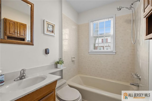 full bath featuring vanity, toilet, and tub / shower combination