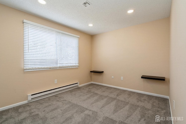 474 Revere Way Unit N, Monroe, NJ 08831 - spare room with baseboard heating, carpet, recessed lighting, a textured ceiling, and baseboards