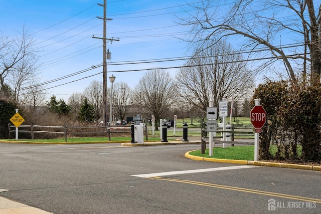 474 Revere Way Unit N, Monroe, NJ 08831 - view of asphalt road featuring traffic signs and curbs