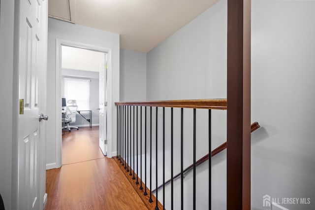 835 Darlington Dr, Old Bridge, NJ 08857 - hallway with wood finished floors and an upstairs landing