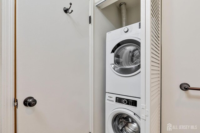 29 Tansy Ct, Bedminster, NJ 07921 - laundry room featuring stacked washing machine and dryer