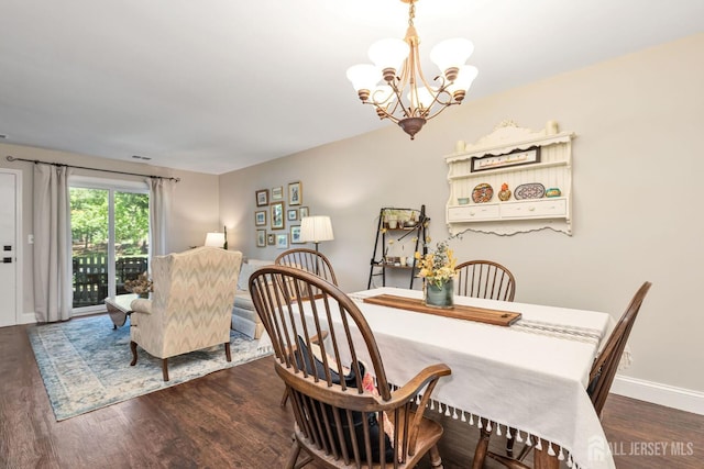 29 Tansy Ct, Bedminster, NJ 07921 - dining area featuring a chandelier, wood finished floors, and baseboards