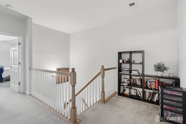 1525 Hudson Cir, Highland Park, NJ 08904 - hallway with carpet and an upstairs landing
