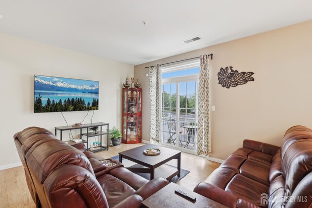 1525 Hudson Cir, Highland Park, NJ 08904 - living room featuring wood finished floors