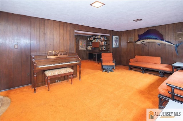 12 Tompkins Rd, East Brunswick, NJ 08816 - sitting room with carpet and wood walls