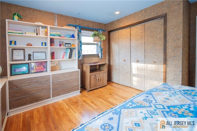 12 Tompkins Rd, East Brunswick, NJ 08816 - bedroom with light wood-style floors and a closet