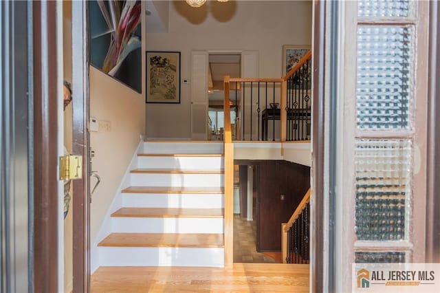12 Tompkins Rd, East Brunswick, NJ 08816 - stairway featuring wood finished floors
