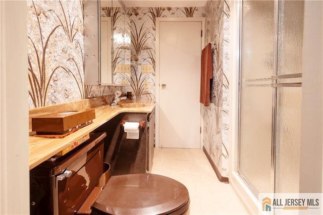 12 Tompkins Rd, East Brunswick, NJ 08816 - bathroom with wallpapered walls, a stall shower, vanity, and tile patterned floors