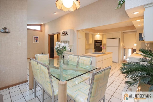 12 Tompkins Rd, East Brunswick, NJ 08816 - dining area with light tile patterned floors