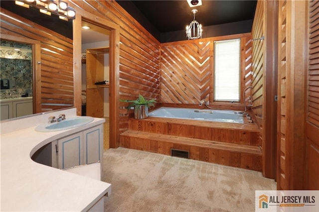 12 Tompkins Rd, East Brunswick, NJ 08816 - bathroom with a garden tub and vanity