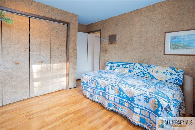 12 Tompkins Rd, East Brunswick, NJ 08816 - bedroom featuring wood finished floors and a closet