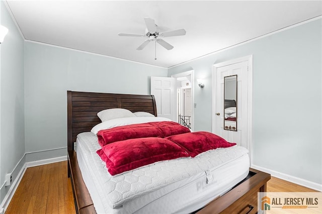 58 Stewart Pl S, Orange Village, NJ 07079 - bedroom with light wood-type flooring, crown molding, baseboards, and a ceiling fan