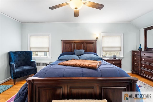 58 Stewart Pl S, Orange Village, NJ 07079 - bedroom featuring radiator heating unit, light wood-style floors, baseboards, a ceiling fan, and lofted ceiling