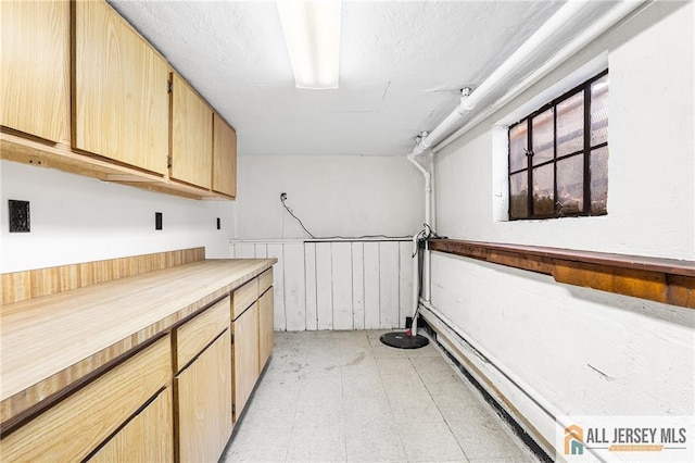 58 Stewart Pl S, Orange Village, NJ 07079 - laundry area with light flooring