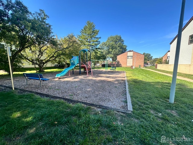 view of jungle gym with a yard