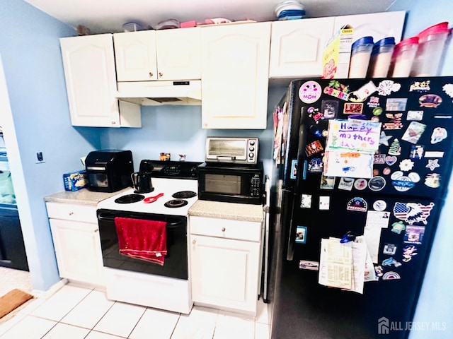 kitchen with white cabinets, light tile patterned floors, and black appliances