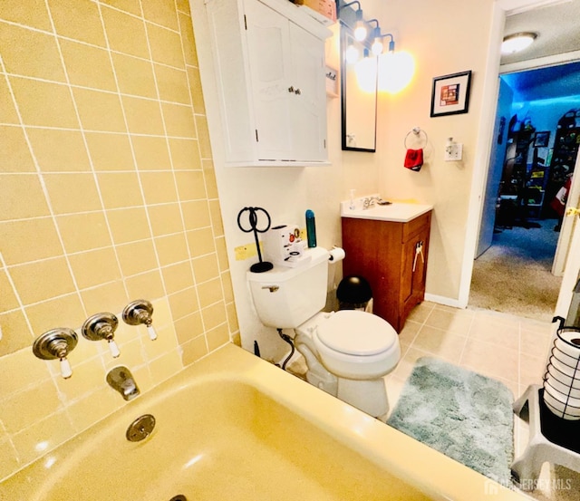 full bathroom with vanity, tub / shower combination, tile patterned floors, and toilet