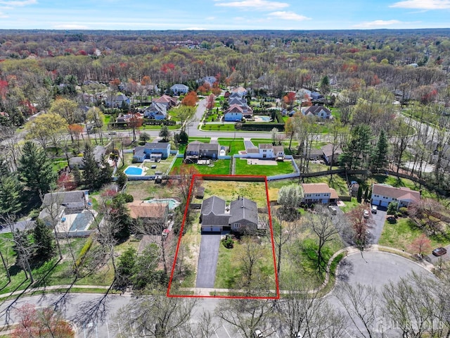 7 Arthurs Ct, Manalapan, NJ 07726 - aerial view of residential area featuring property parcel outlined and a heavily wooded area
