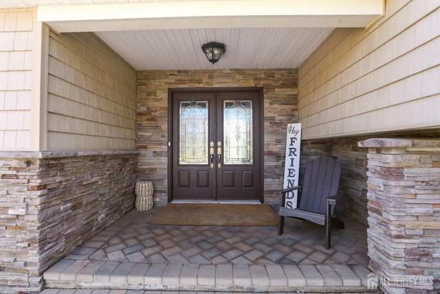 7 Arthurs Ct, Manalapan, NJ 07726 - entrance to property with french doors and covered porch