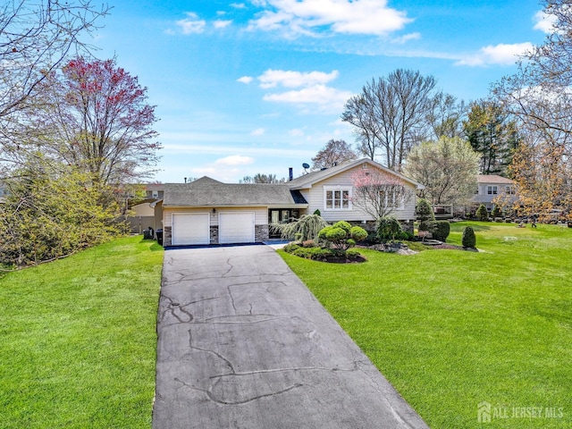 7 Arthurs Ct, Manalapan, NJ 07726 - split level home featuring a garage, a front lawn, asphalt driveway, and stone siding