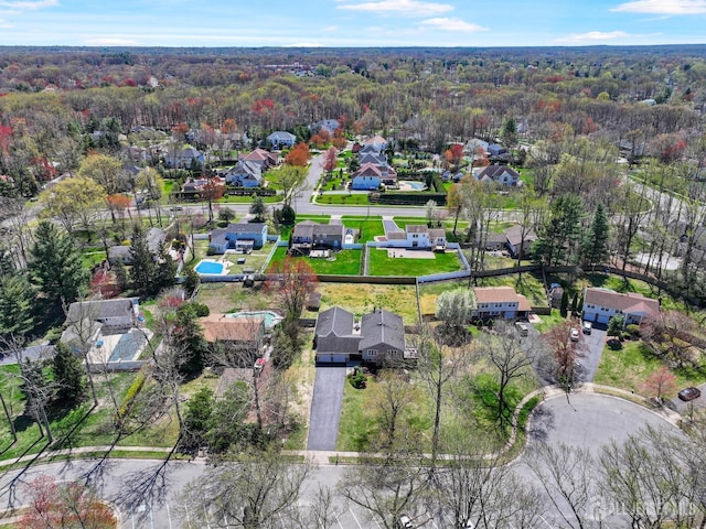 7 Arthurs Ct, Manalapan, NJ 07726 - aerial view of property and surrounding area with nearby suburban area and a forest