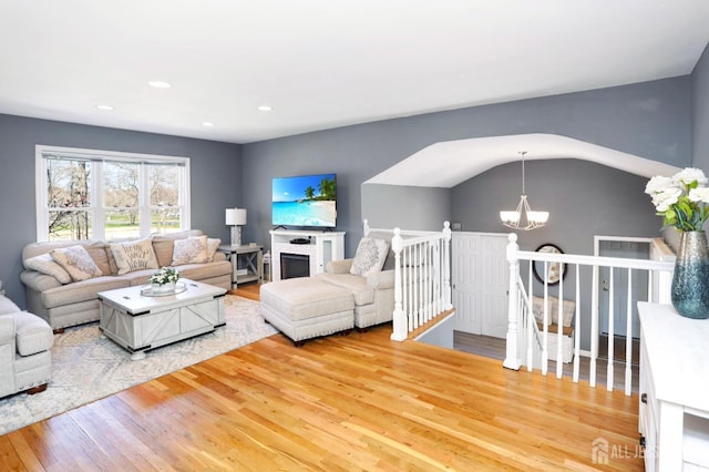 7 Arthurs Ct, Manalapan, NJ 07726 - living area featuring a chandelier, light wood finished floors, and recessed lighting