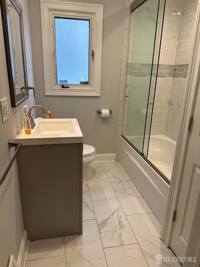 29 Glendale Rd, Colonia, NJ 07067 - full bath featuring marble finish flooring, baseboards, vanity, toilet, and enclosed tub / shower combo