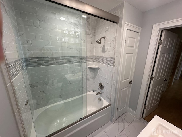 29 Glendale Rd, Colonia, NJ 07067 - bathroom featuring combined bath / shower with glass door, marble finish floors, and baseboards