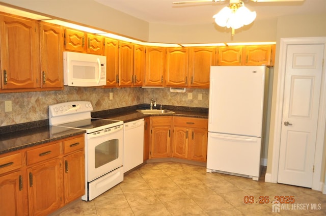 9-B Melborn Dr Unit 9B, Monroe, NJ 08831 - kitchen with white appliances, dark countertops, ceiling fan, and backsplash