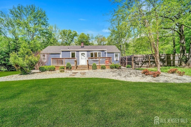 15 Federal Rd, Monroe, NJ 08831 - view of front facade featuring a chimney and a wooden deck