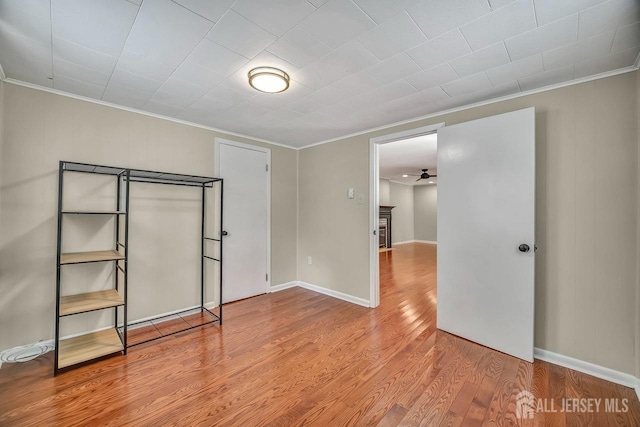 15 Federal Rd, Monroe, NJ 08831 - unfurnished bedroom with ornamental molding, wood finished floors, and baseboards
