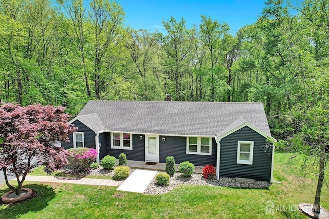 15 Federal Rd, Monroe, NJ 08831 - view of front of property featuring a chimney, a front lawn, and roof with shingles