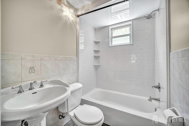 15 Federal Rd, Monroe, NJ 08831 - full bathroom featuring tile walls, toilet, bathing tub / shower combination, a sink, and radiator heating unit