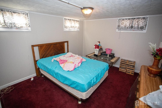 carpeted bedroom with baseboards and ornamental molding