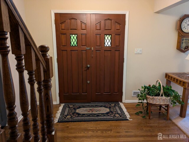 foyer with hardwood / wood-style floors