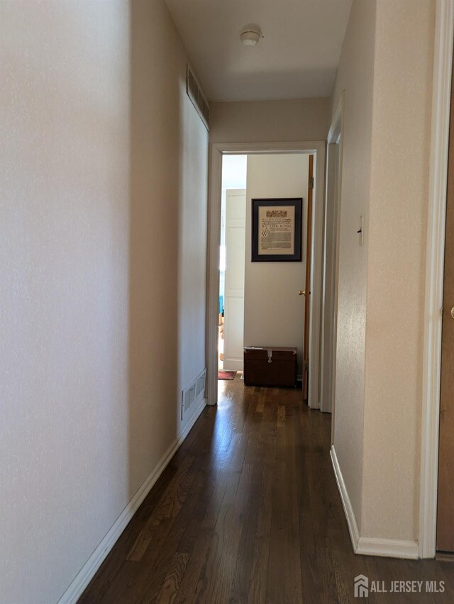 hall featuring dark hardwood / wood-style flooring