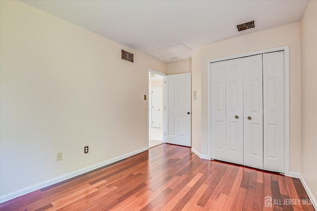 2 Durham Way E, Windsor, NJ 08520 - unfurnished bedroom featuring light wood-style flooring, baseboards, and a closet