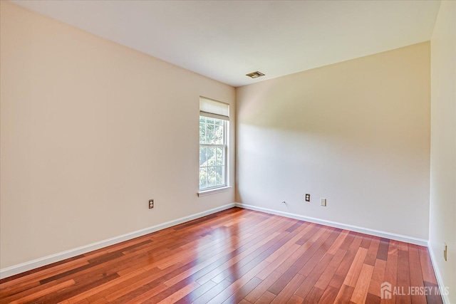 2 Durham Way E, Windsor, NJ 08520 - spare room with hardwood / wood-style flooring and baseboards