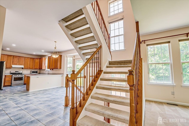 2 Durham Way E, Windsor, NJ 08520 - stairs featuring plenty of natural light, recessed lighting, and baseboards