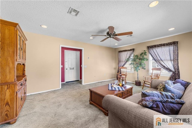 living room with ceiling fan, carpet flooring, recessed lighting, a textured ceiling, and baseboards